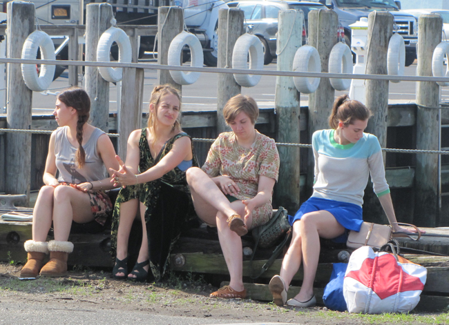 CYNDI MURRAY PHOTO | The 'Girls' cast, featuring Zosia Mamet (from left), Jemima Kirk, Lena Dunham and Allison Williams at the end of Main Street in Greenport.