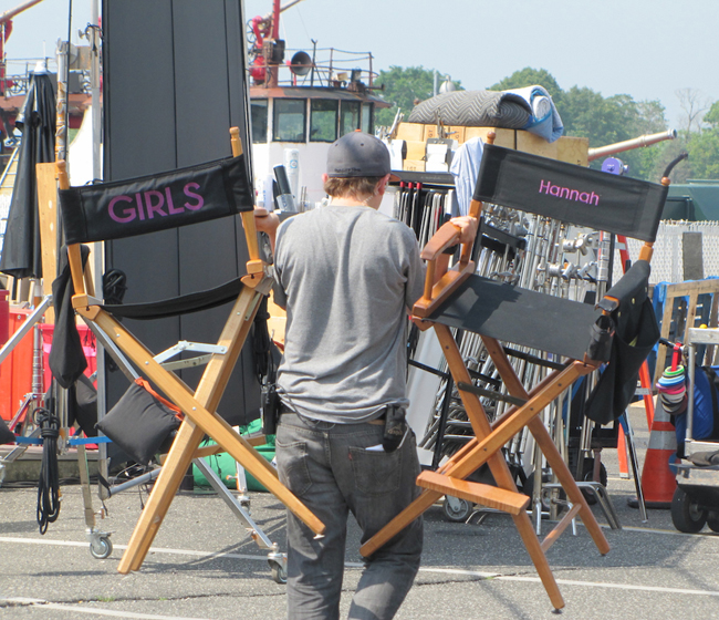 CLAIRE LEADEN PHOTO | A 'Girls' crew member clears the set.
