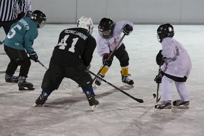 KATHARINE SCHROEDER PHOTO | Greenport Village partnered with the Town of Oyster Bay for a friendly game at Mitchell Park Saturday night.