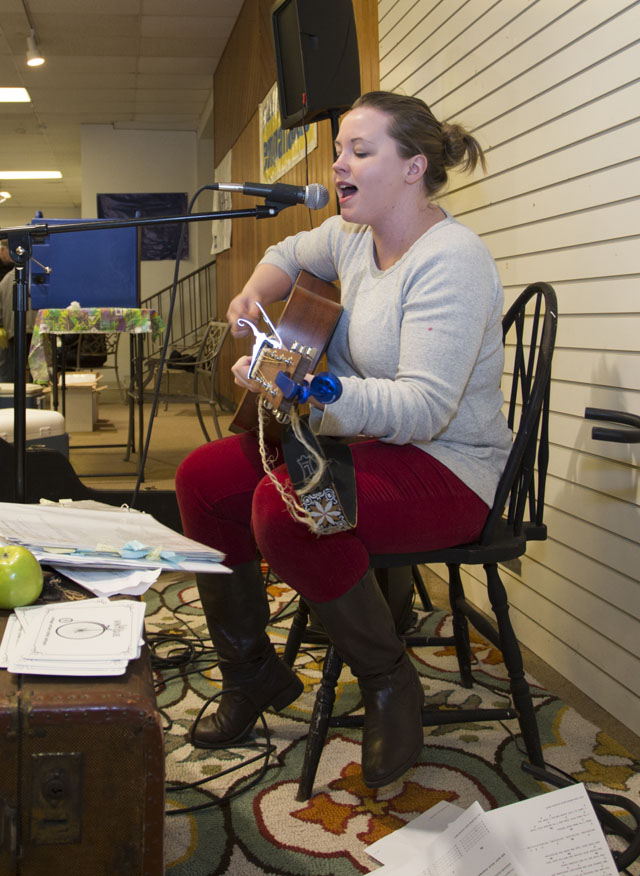KATHARINE SCHROEDER PHOTO  |  Singer-songwriter Larrin M. Gerard performs for the shoppers.