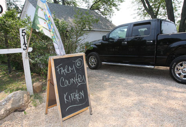 Farm Country Kitchen might be hard to find, unless you catch this little sign as you drive by on West Main Street, but it has the most reviews on Yelp.