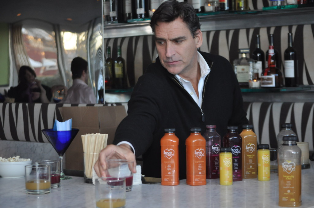 The Riverhead Project owner Dennis McDermott serving samples on the bar's new healthy cocktails. 