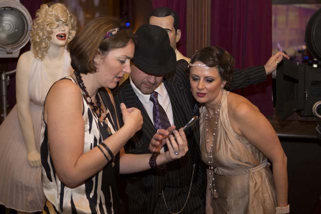 Vladimir and Albina Magill, right, of Staten Island check out their photo on a friend's phone.