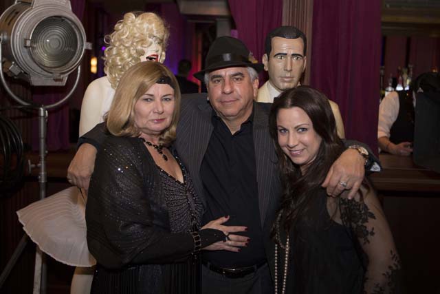 Suffolk Theater owners Dianne and Bob Castaldi with daughter Tara Vitsent.