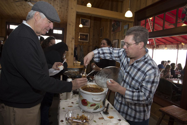 Michael Stebner serves chili to Richard Jordan of Cutchogue.