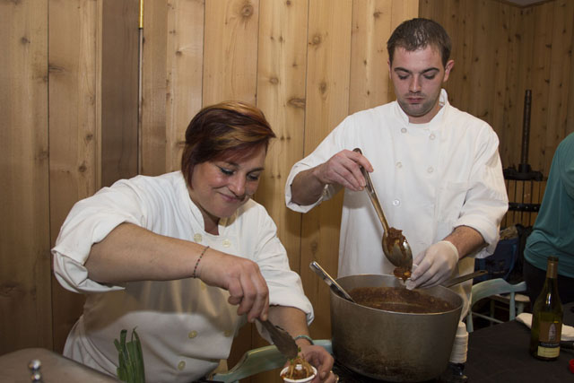 Lia Fallon, left, and Chril Zullo from the Riverhead Project serve up a braised short rib and smoked wild boar chili.