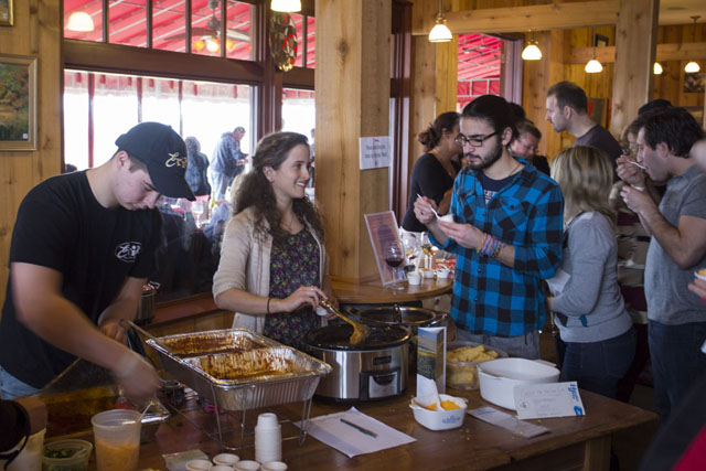 From left:  Dylan Brown of Erik's in Southold, Christine Tylee and Gabriel Meeks from Group for the East End.