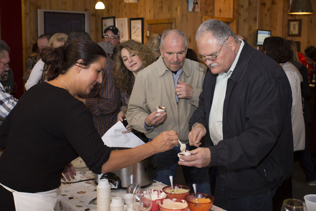 John Rakowski, left, of Floral Park and John Sharkey of Franklin Square enjoy samples.