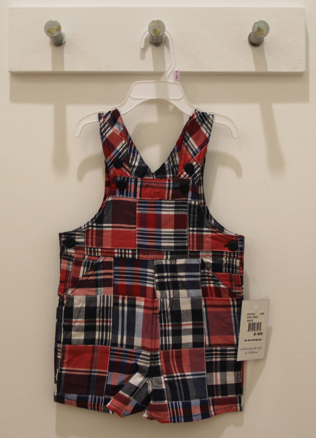 Plaid boy's overalls for $40 are on sale at 50 percent off. 