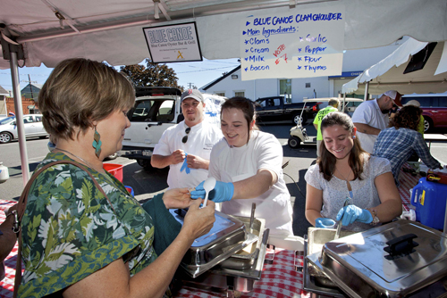 The crew from the Blue Canoe hands out chowder during the 2012 festival. (Credit: Katharine Schroeder, file)
