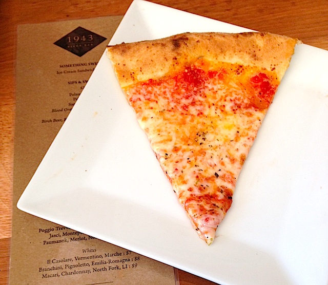 Enjoy a pie at Rolling in Dough's new pizzeria for $13.