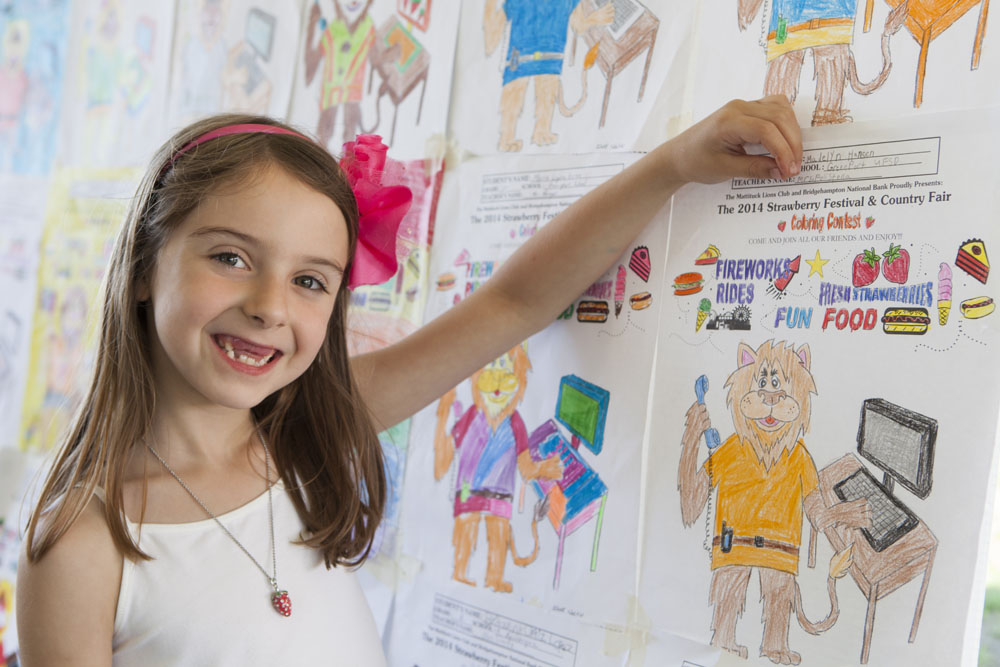 adelyn Hansen, 7, of Greenport with her coloring contest entry. (Credit: Katharine Schroeder)