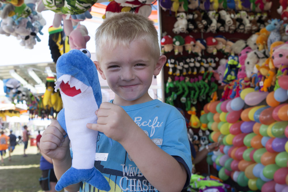 Jake Mancuso, 3, of E. Quogue, won this prize throwing darts at balloons. (Credit: Katharine Schroeder)