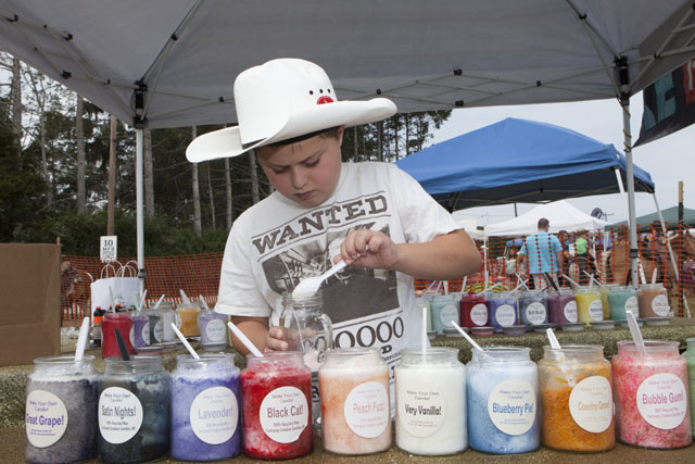 Connor Colontonio, 9, of East Northport creates his own candle.