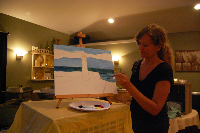 Sarah Cutler of Southampton instructs Peconic Paint and Sip students at the Outerbanks in Riverhead. (Credit: Vera Chinese)