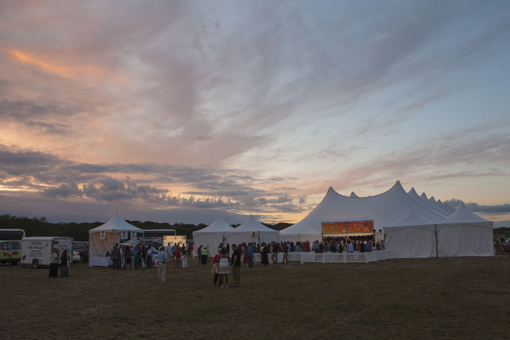 The sun sets behind the event venue. (Credit: Katharine Schroeder)