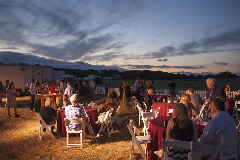 The sun goes down as people enjoy the evening. (Credit: Katharine Schroeder)