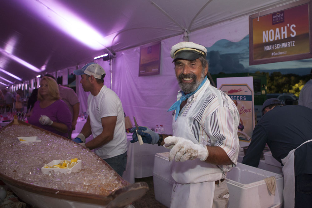 Captain Dave Berson shucks clams for Noah's. (Credit: Katharine Schroeder)