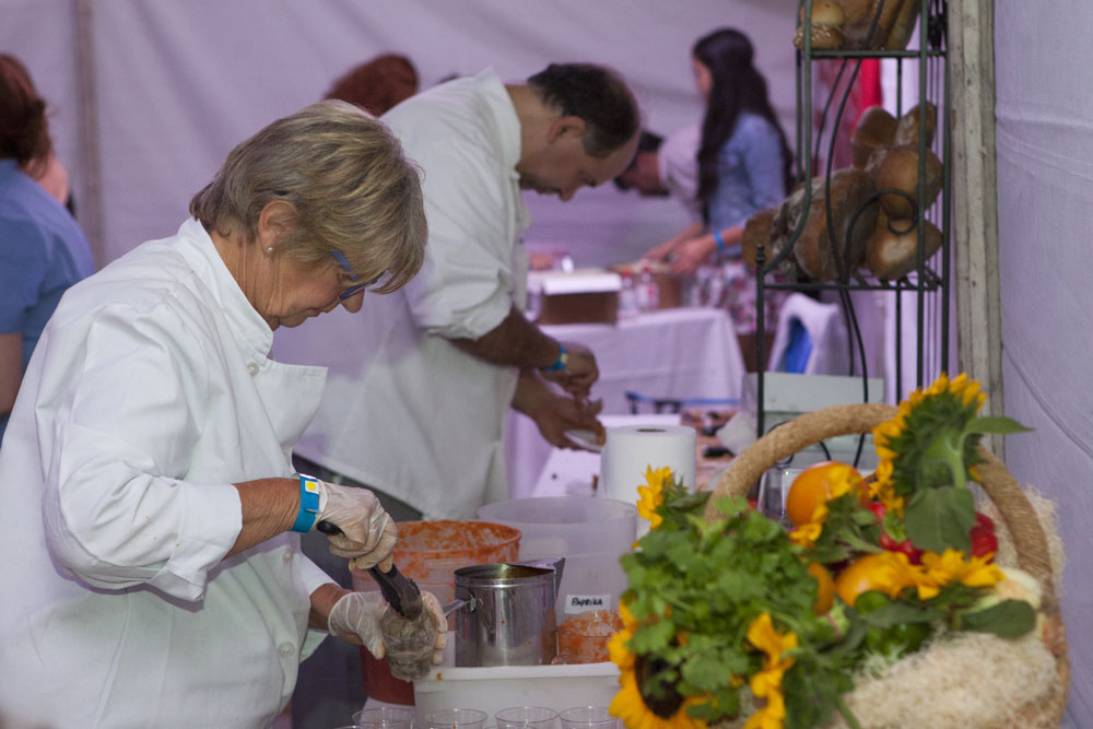A Taste of the North Fork's Jeri Woodhouse, foreground, and Blue Duck Bakery's Keith Kouris hard at work. (Credit: Katharine Schroeder)