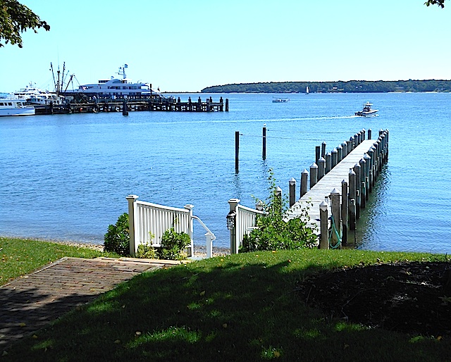 Harbor Knoll has a private dock and beach overlooking Greenport Harbor.