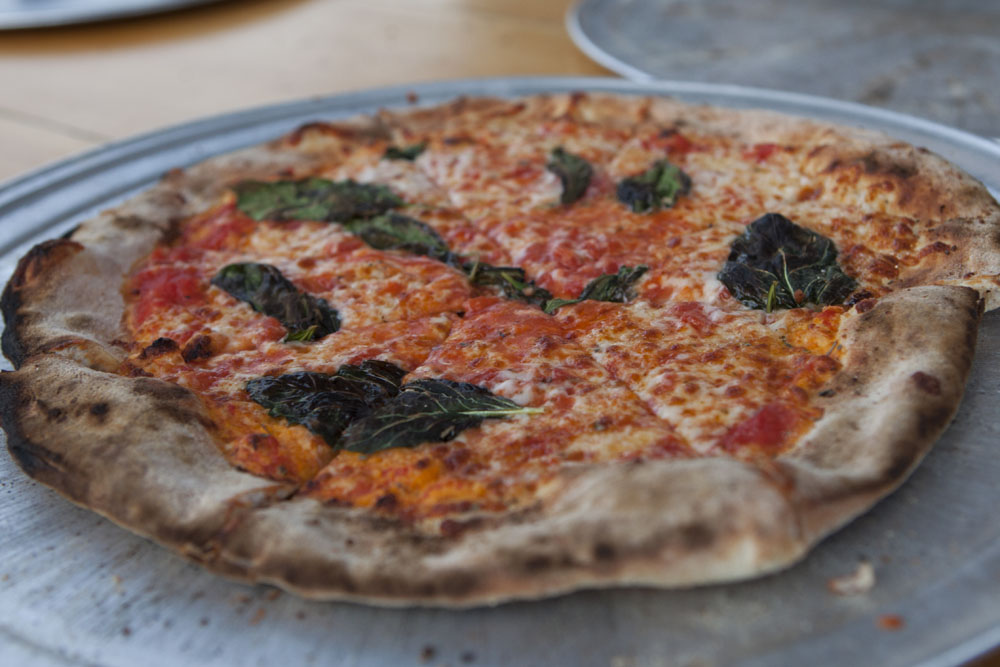 Rolling in Dough's famous pizza. (Credit: Katharine Schroeder)