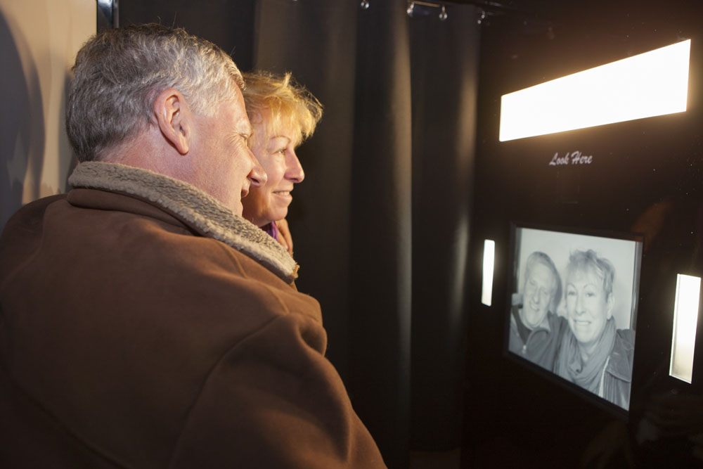 Cynthia and Geoff Wells in the photo booth. (Credit: Katharine Schroeder)
