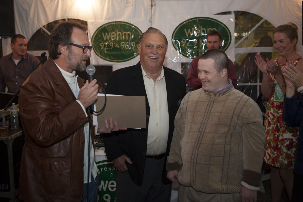 Mayor David Nyce awards Paul Drum the "Mayor for the Day" award as East End Seaport Museum president Ron Breuer looks on. (Credit: Katharine Schroeder)