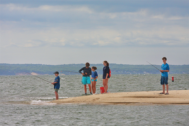 Children fishing at the association's private bay beach. (Barbaraellen Koch)