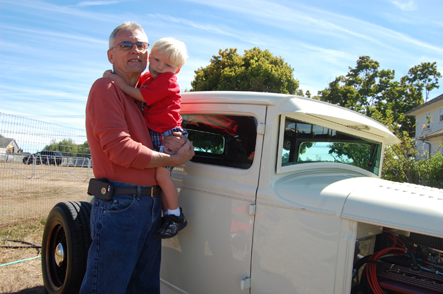 Jim Kelly of East Moriches and grandson Sean Kelly, 3, of Manorville pose near grandpa's 1931 Model A Ford.