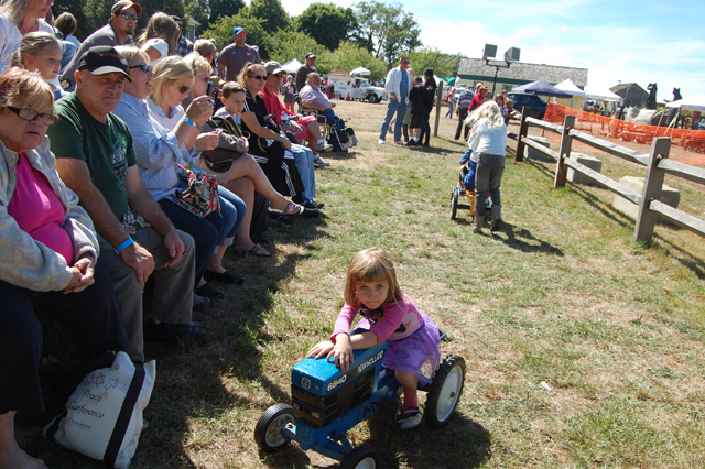 Spectators at the tractor pull competition.