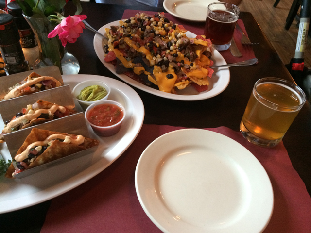 Steak nachos and crispy duck tacos at North Fork Tasting Room. (Credit: Vera Chinese)