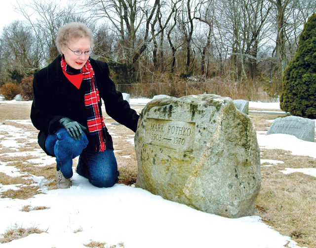 Rothko, Mark JA 03-22-07T--Photo by Judy Ahrens--Nancy Poole, secretary/treasurer of the East Marion Cemetey Association beside the Mark Rothko gravestone at the cemetary on Monday.