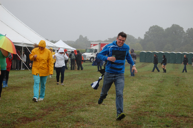 Frank Krupski of Mattituck runs to get out of the rain.