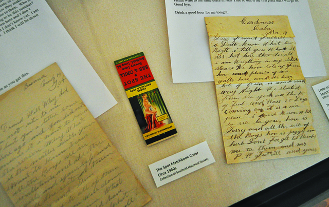 RACHEL YOUNG PHOTO Among the artifacts on display at Southold Historical Society's new exhibit, 'No Peeking: A History of Prostitution in Southold Town, ' is a pair of letters written in 1884 by a young man relating his experiences with Cuban prostitutes to a friend in Mattituck. (Credit: Rachel Young)