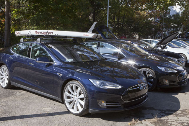 Tesla cars on display.