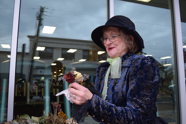 Linda McKnight of Riverhead as a flower seller story teller. (Credit: Vera Chinese)