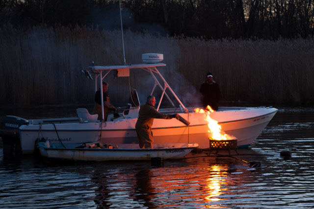 Keeping the floating fires burning.