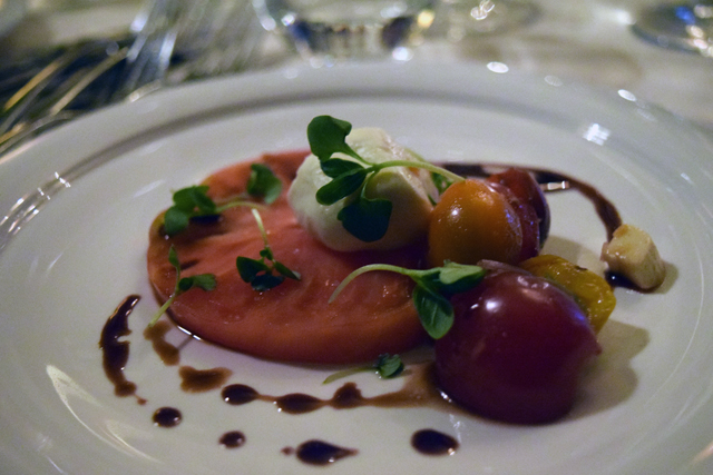 Marinated floras greenhouse heirloom cherry tomatoes with fresh mozzarella made from Mecox Bay Dairy milk.