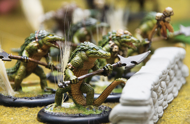 Tactics in battle may determine a game's strategy, but the hobby also has another side: the modeling and painting of figurines. Small models can be completed quickly, while larger, more complicated figures can take days to finish. (Credit: Paul Squire)