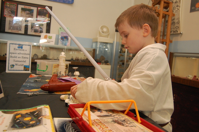 ran Smith, 6, of Massapequa visited the Long Island Science Center in Riverhead on Saturday. He received free admission for dressing like Luke Skywalker. (Credit: Vera Chinese file photo)