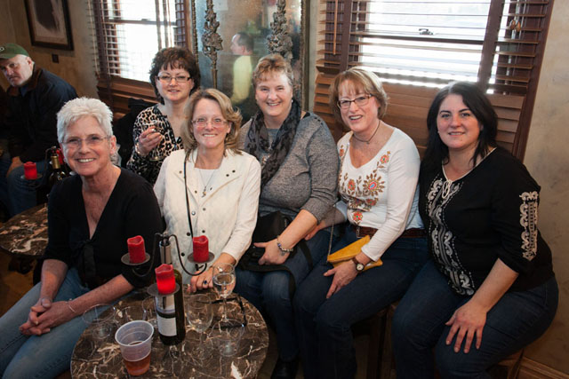 A group of friends enjoying the music on a winter afternoon.  From left:  Carol Wilson, Sharon Langinbach, Karen Funes, Charlotte Brouwer, Kim French, and Christine Barts. (Credit: Katharine Schroeder)
