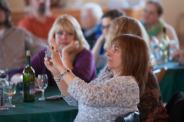 Lori Ciemielewski of Manorville takes a snapshot of the band.