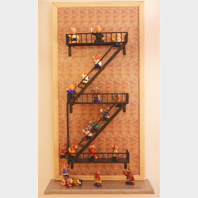 Second Place was an assemblage by Charles Manfredi of East Islip, depicting zombies learning to climb ladders titled "A Night on the Town."