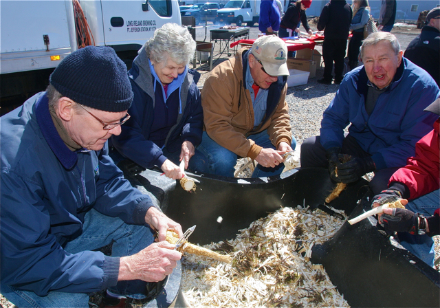 Hard at work (from left) are Jim Creighton, Ginny Taylor, Wes Slivonik and Zenon Czujko.