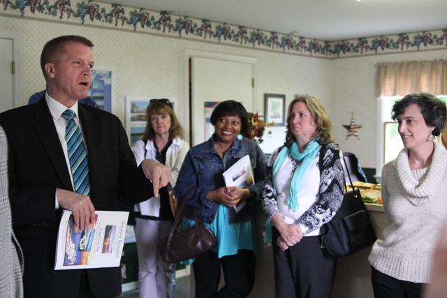 Southold Town Supervisor Scott Russell, left, thanking the North Fork Promotion Council.