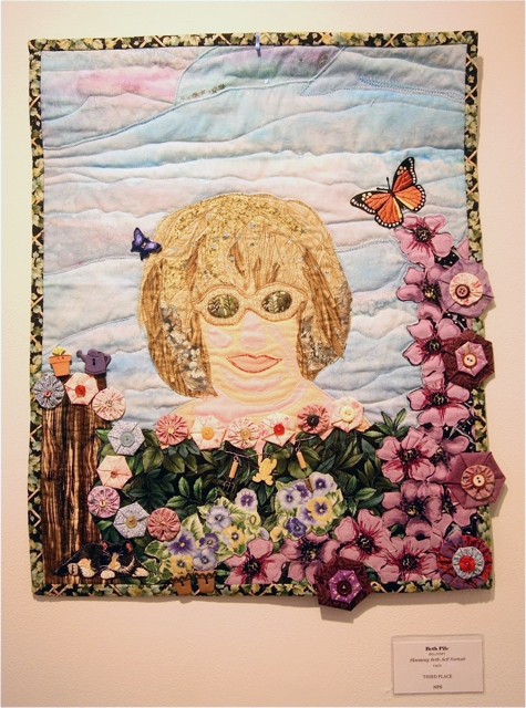 Third Place went to Beth Pike of Bellport for her fiber creation titled "Blooming Beth-Self Portrait."