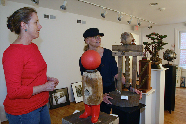 Guest Juror Margery Gosnell-Qua (left) with East End Arts gallery director Jane Kirkwood as Gosnell-Qua selects art works last Monday afternoon for the the show "Novel Materials/New Techniques" which opened Friday June 19.