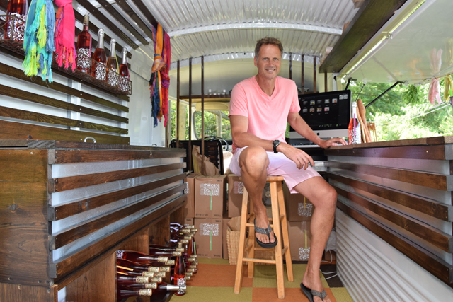 Michael Croteau inside the "Rosé on the Run" van. (credit: Vera Chinese)
