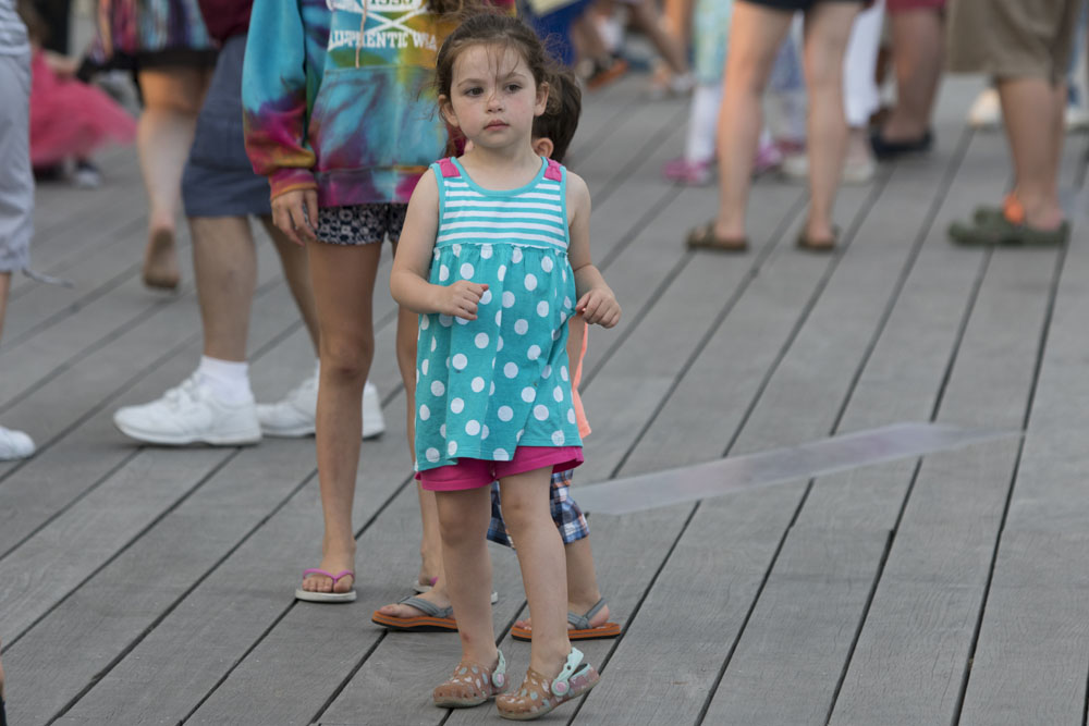 A youngster enjoys a dance.