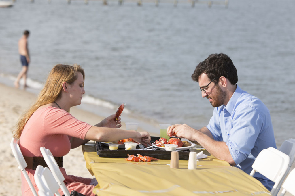 A couple enjoys the feast during the 2013 Lobsterfest. (Credit: Katharine Schroeder)